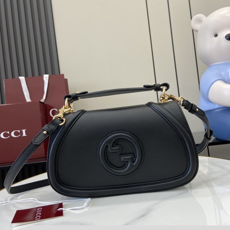 G*u*i top handle bags